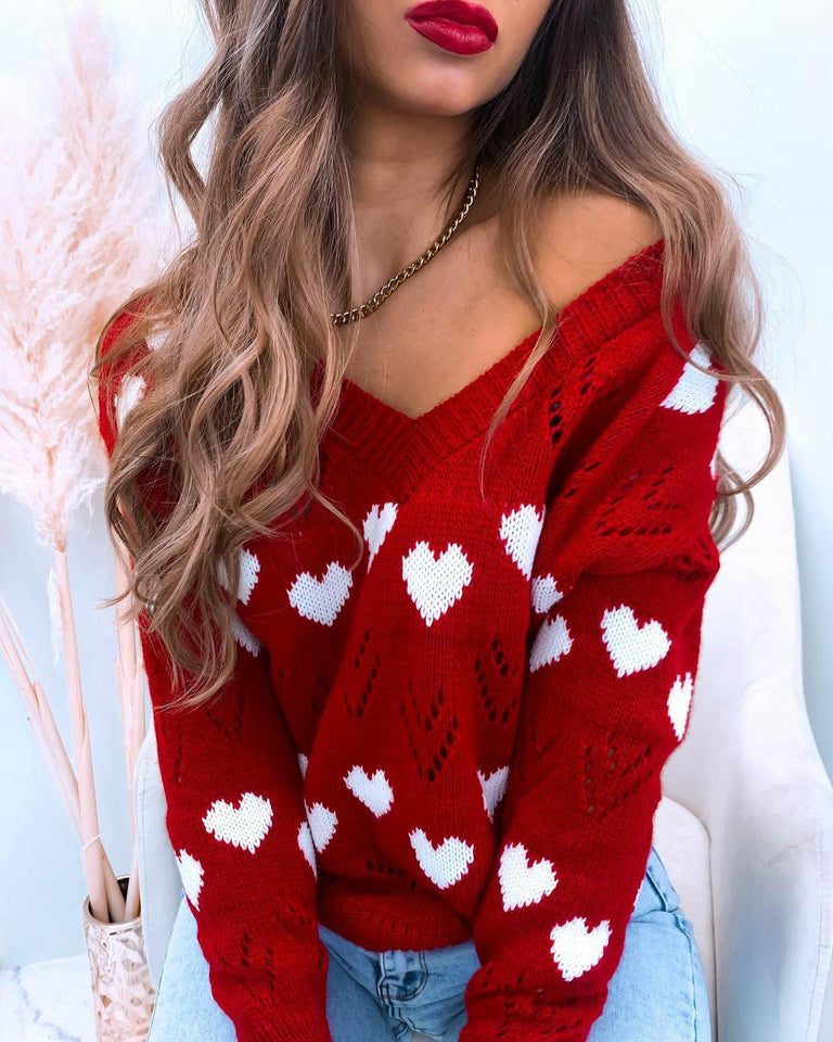 2021 autumn and winter women's sweater Europe and the United States new wish leisure V-neck love off-shoulder hollow sexy knitted sweater